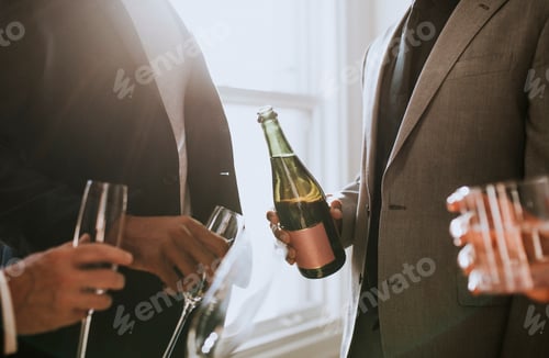 Preview: Team celebrating with champagne