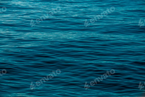 Preview: Calm Turquoise Water Surface Reflecting Soft Light in the Afternoon