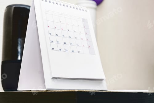 Preview: Calendar stands on a shelf. Deadline and office concept
