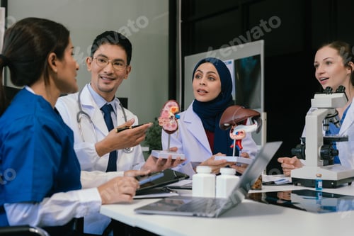 Preview: Medical, meeting and laptop for team in office in discussion, brainstorming and planning.