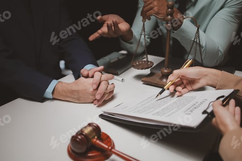 Preview: A group of lawyers is discussing contract documents that must be presented to a client, Lawyers brai