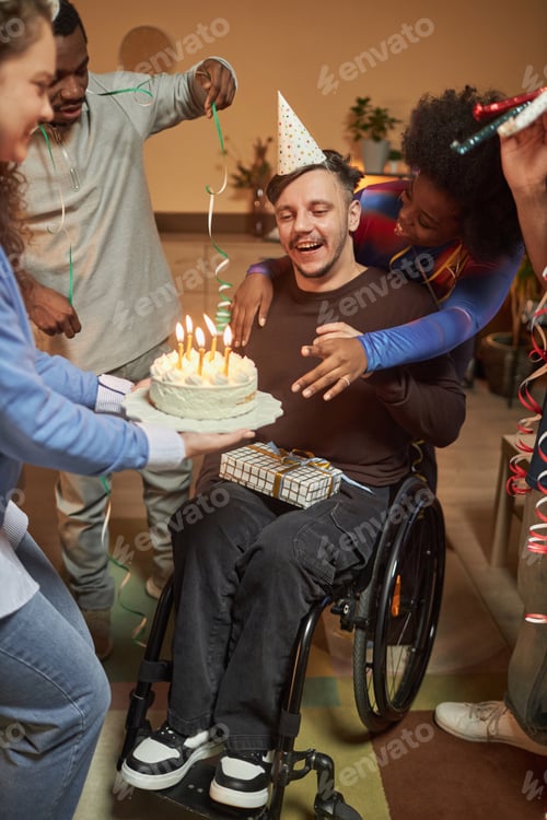 Preview: Man with Disability Celebrating Birthday with Friends