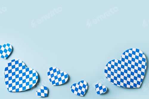 Preview: Oktoberfest paper cut heart design on blue background