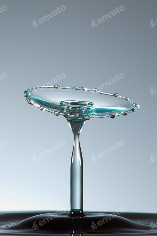 Preview: Splash of colorful liquid with high speed flash