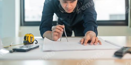 Preview: Engineer planing and working on table construction working at office