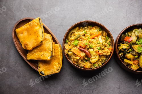 Preview: Bengali Bhog food for Indian Hindu Durga Puja or pooja festival. Khichadi, labra, tomato chutney