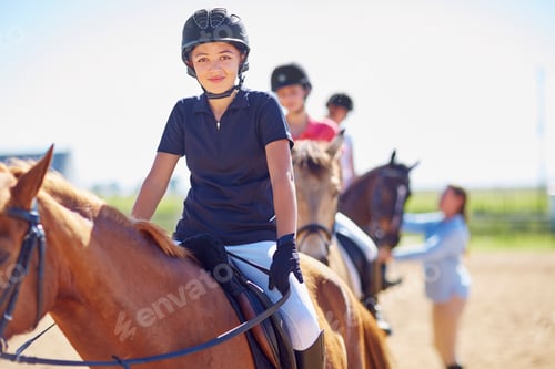 Preview: Portrait of confident girl on horse