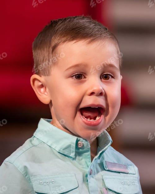 Preview: Adorable young boy or toddler sings on stage during a performance