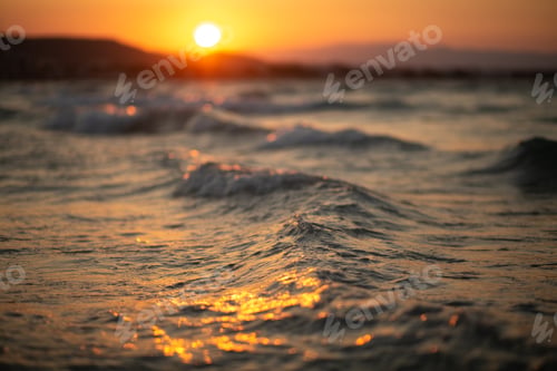 Preview: the sunset by the sea with the waves