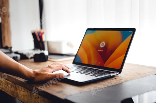Preview: Close up of businessman working and login on laptop