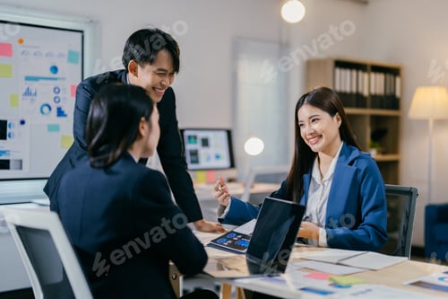 Preview: Asian businesspeople having a casual meeting, discussing, brainstorming, and working together as a