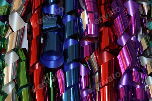 Preview: Multi Colored Curled Ribbon Background - Photograph Of Red, Green, Purple, Silver, And Blue Curled