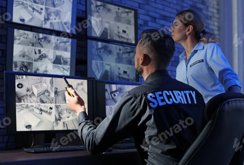 Preview: Security guards monitoring modern CCTV cameras indoors