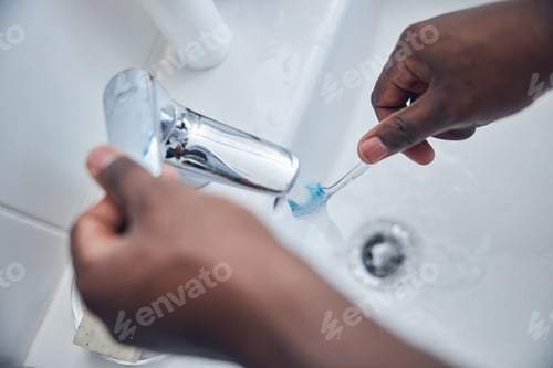 Preview: Focused photo on brush that being in male hands