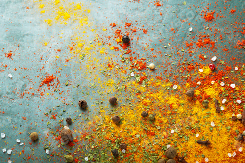Preview: Different spices scattered on the table, red paprika powder, turmeric, salt, cloves, pepper