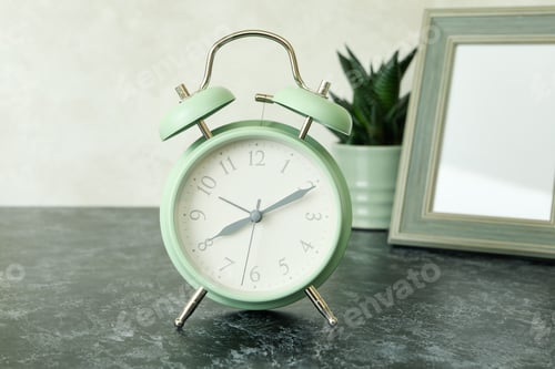 Preview: Alarm clock, photo frame and succulent on black smokey table