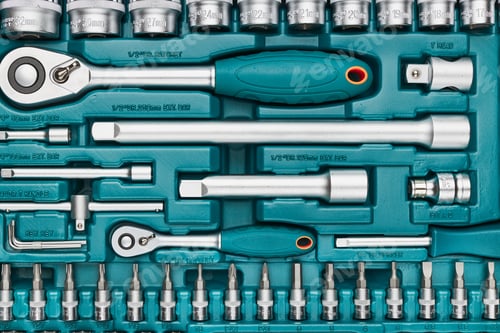 Preview: Ratchet with many attachments in plastic case. Work tools. Universal tool set. Background