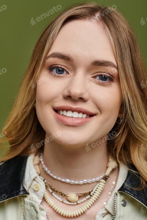 Preview: Young woman showcases stylish spring attire with charm and confidence in a fresh setting