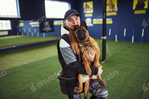 Preview: Trainer and a beautiful quiet puppy during the training session