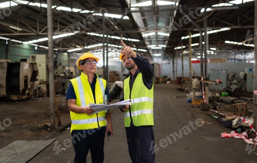 Preview: Portrait of technician team leader and team that is ready for repairing old machinery