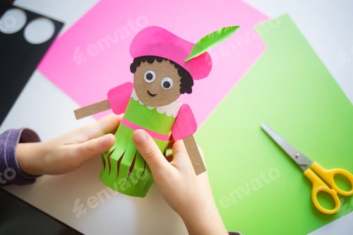 Preview: paper craft for kids. DIY toy Black Pete Zwarte Piet for sinterklaas day. create art for children.