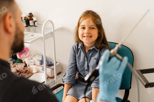 Preview: Pediatric ENT calms child before rhinoscopy nose procedure