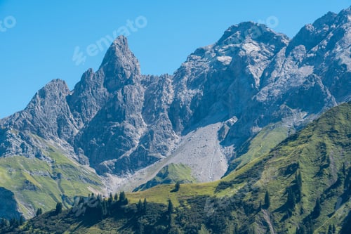 Preview: Beautiful view of a mountain with a clear blue sky in the background