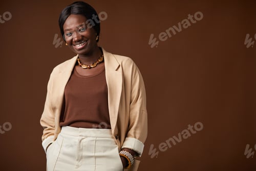 Preview: Carefree African-American Woman Posing in Studio