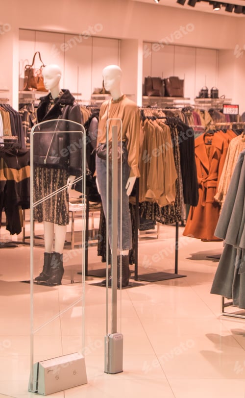 Preview: Clothing on Mannequins Inside of Retail Fashion Store