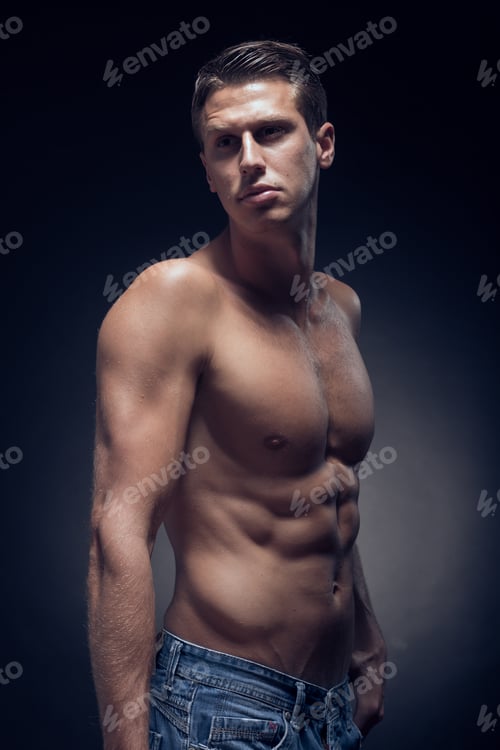 Preview: One Young Adult Man, Caucasian, Fitness Model, Muscular Body, Shirtless, Jeans, Black Background