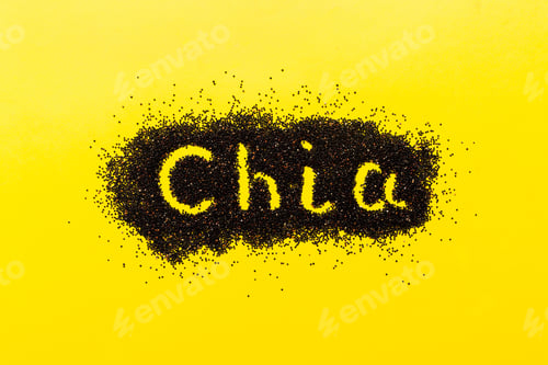 Preview: chia word made from chia seeds top view on colored background. Healthy superfood