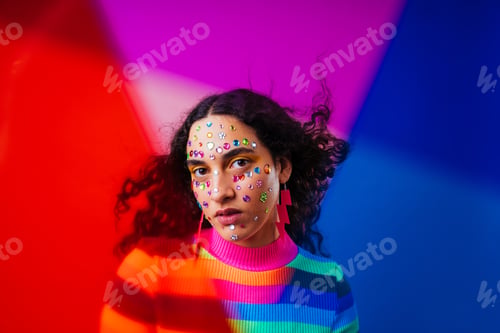 Preview: Creative studio portrait of beautiful hispanic woman with diastema