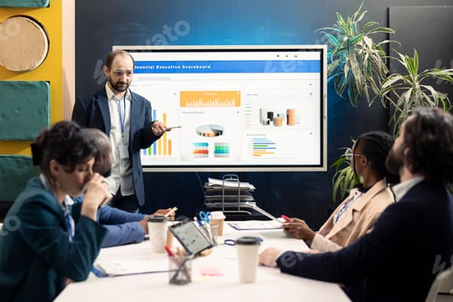 Preview: Team of enterprise workers preparing presentation pitch on interactive board