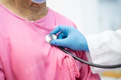 Preview: Doctor using stethoscope to checking the patient sit down on a bed in the hospital