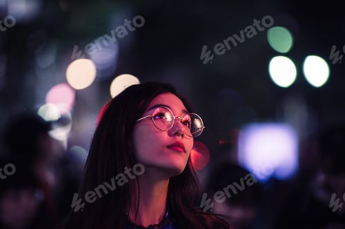 Preview: Pretty asian woman portrait with led lights