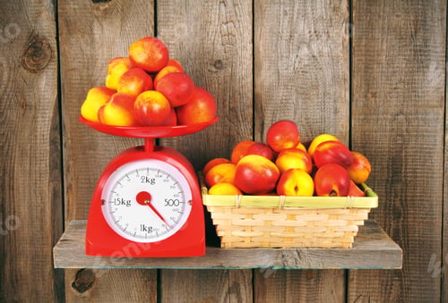 Preview: Apricots on scales and in a basket