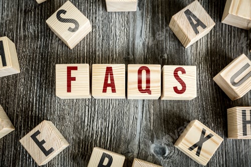 Preview: Wooden Blocks With The Text: Faqs