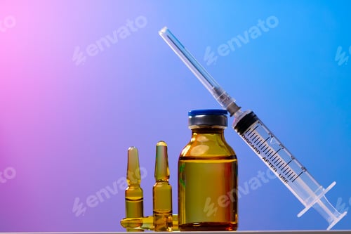 Preview: Medical vial with medication and syringe close up