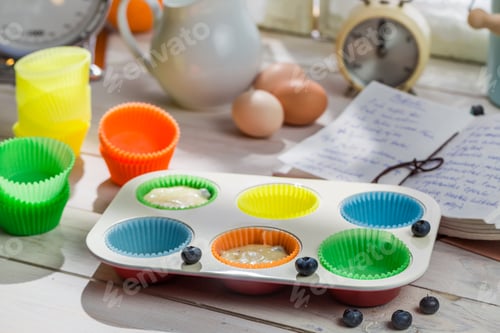 Preview: Bright Cupcake Liners with Muffins Baking Preparation
