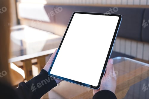 Preview: Mockup image of a woman holding digital tablet with blank white desktop screen