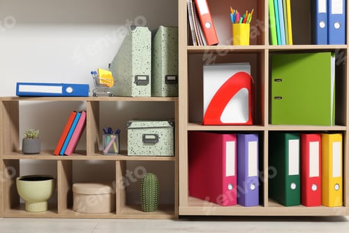 Preview: Colorful binder office folders and other stationery on shelving unit