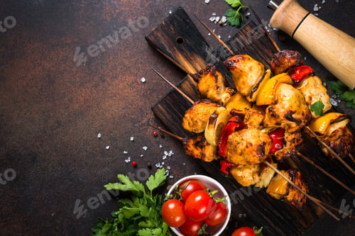 Preview: Chicken kebab with vegetables on skewers top view