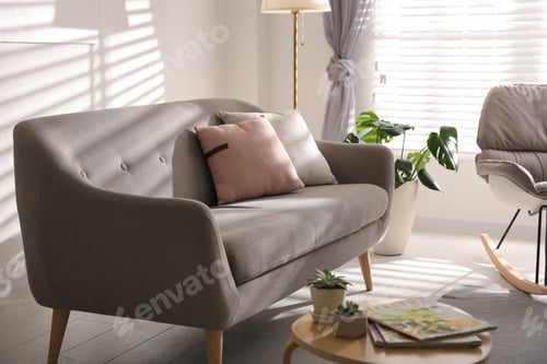 Preview: Stylish living room interior with comfortable sofa and wooden table
