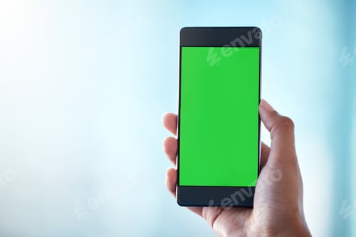 Preview: Shot of an unrecognisable person using a smartphone with a green screen on it