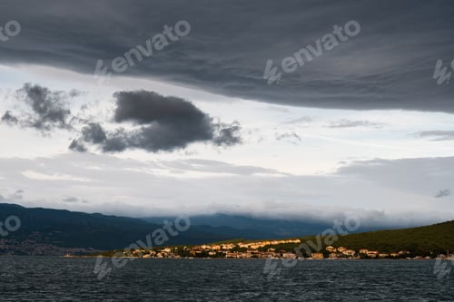 Preview: Dark clouds over Klimno town , Krk Island