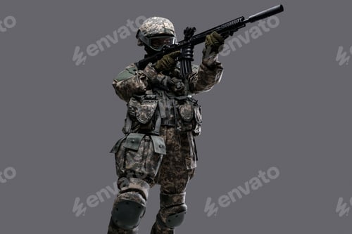 Preview: Special forces servicewoman aiming rifle against grey background