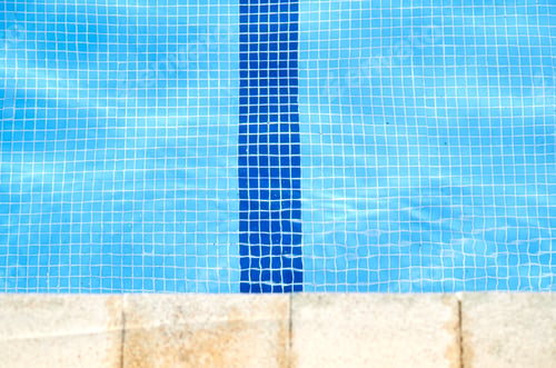 Preview: Blue mosaic bathroom or kitchen tile wall. Ceramic tiled floor or swimming pool