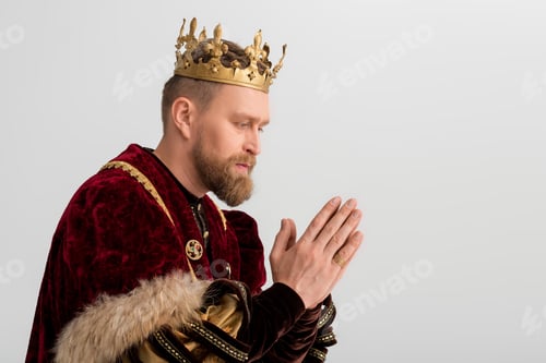 Preview: side view of king with crown praying isolated on grey