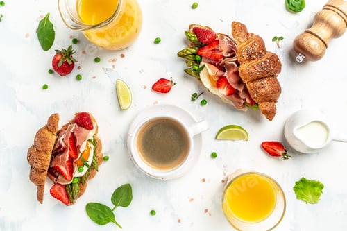 Preview: coffee and croissants with avocado, asparagus, jamon, ham, prosciutto, strawberries,