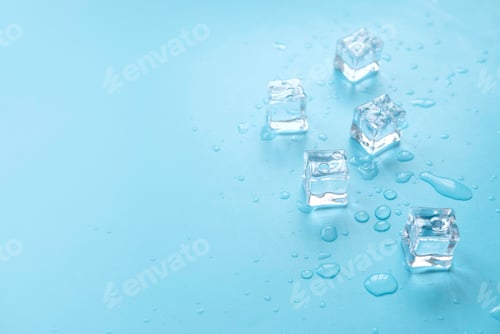 Preview: Concept of cold and refreshing. Ice cubes with water drops on a blue background.